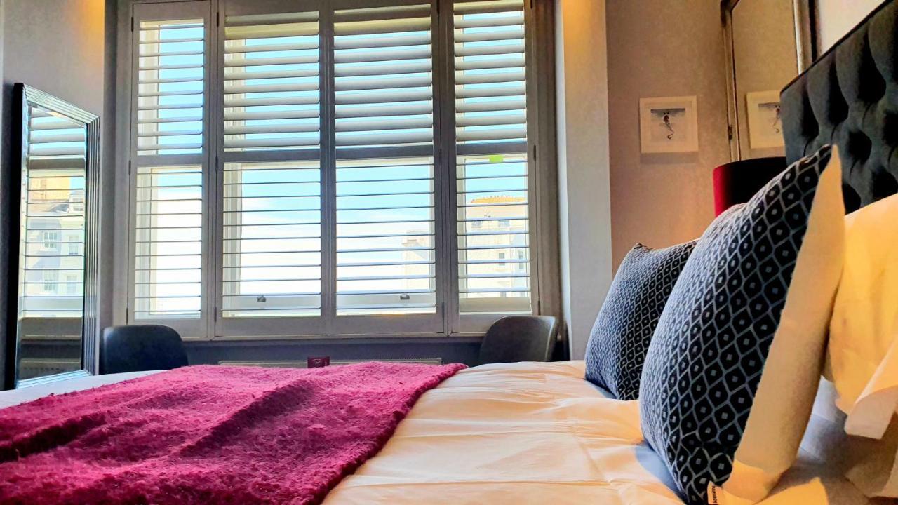 A Room With A View Hove Exteriér fotografie A bedroom at the hotel